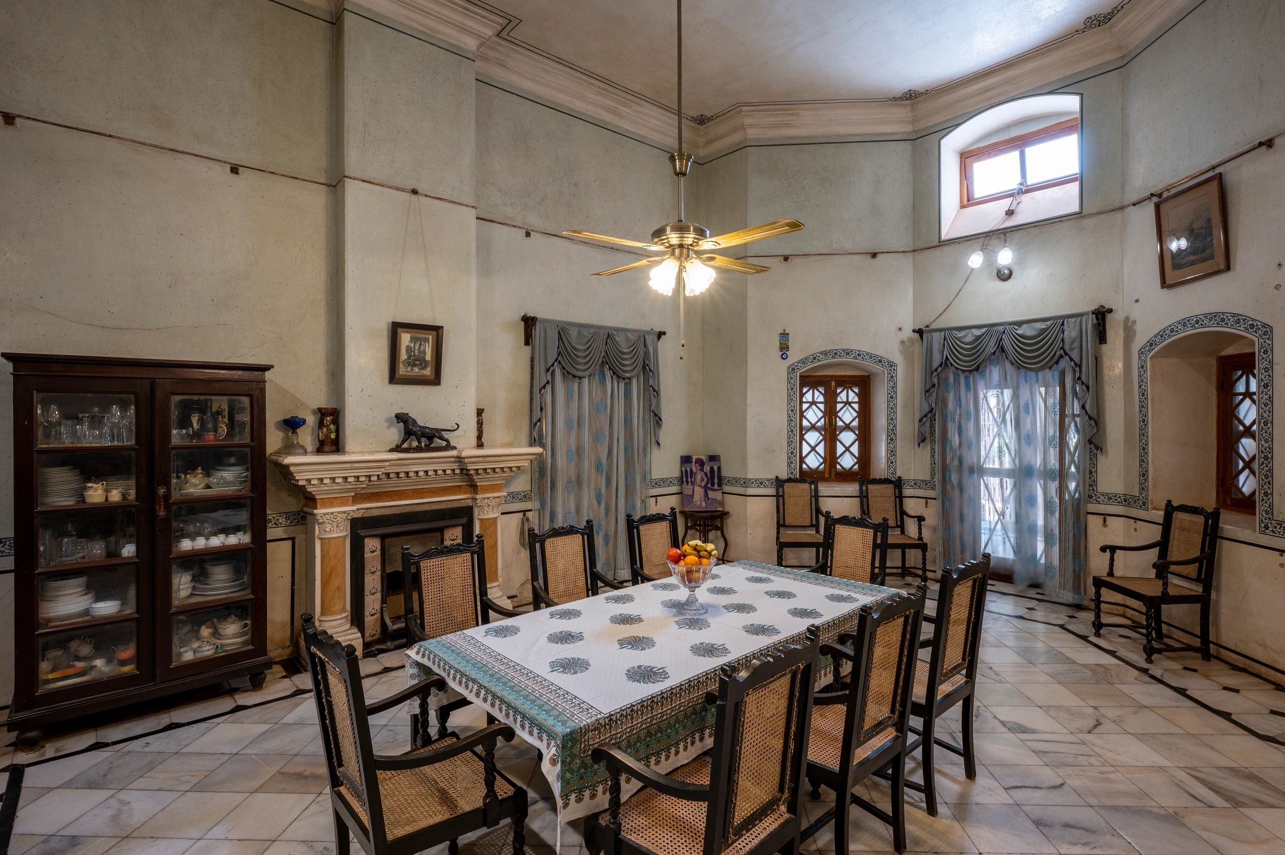 Colonial dining room with wooden table in heritage mansion